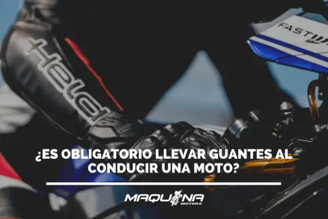 Motociclista con guantes negros, listo para rodar. ¿Es obligatorio llevar guantes en moto? La seguridad es lo primero.