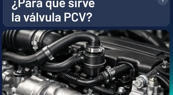 Detalle de la válvula PCV en un motor de coche, esencial para el control de gases.